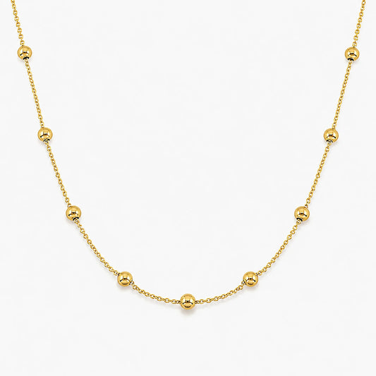 Lucche 14K gold beaded necklace with polished gold spheres on a delicate chain