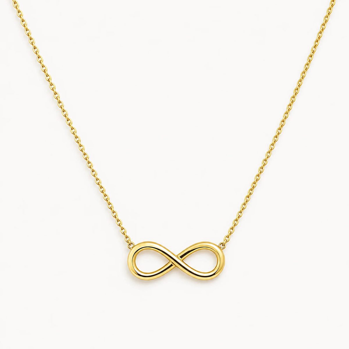 Lucche 14K gold infinity symbol pendant on a delicate gold chain against a white background