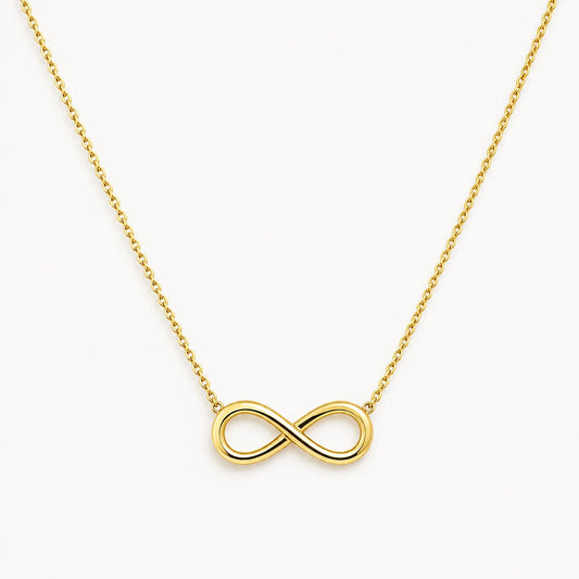 Lucche 14K gold infinity symbol pendant on a delicate gold chain against a white background