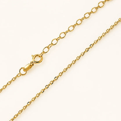 Close-up of a Lucche solid 14K gold anchor chain necklace with a secure clasp.